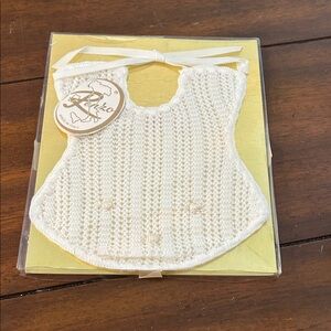 Delicate crocheted baby bib. NIB